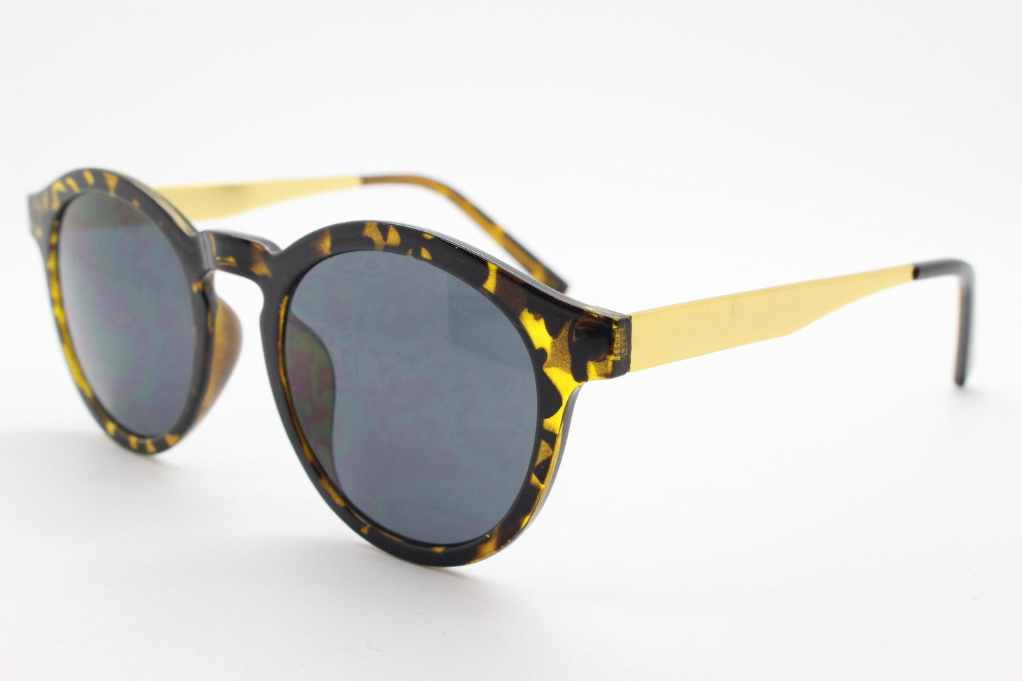 90s vintage round glasses. Tortoise 40s style frame with contrasting gold arms