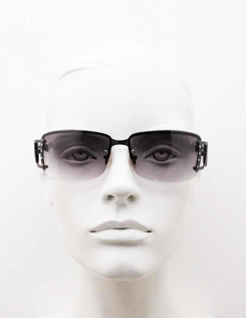 Y2K vintage rectangular wrap around sunglasses. Black half frame with grey metal trim, diamante detail and graduating lenses. Rhinestone