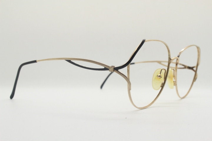 Viennaline 70s vintage angular round eye glasses. Slightly oversized subtle gold chrome optical frame with incredible arms. Prescription RX