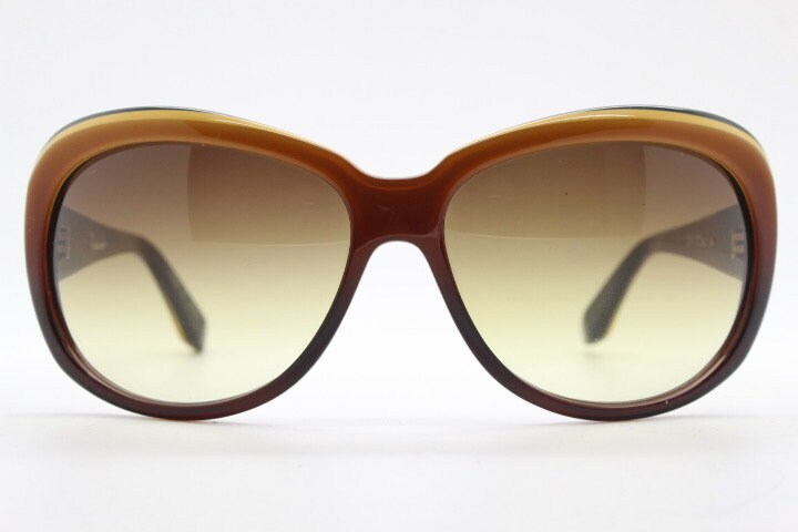 Dita oversized 70s design sunglasses model Pretender made in Japan. Gorgeous brown and black layered acetate. Womens NOS. 60s