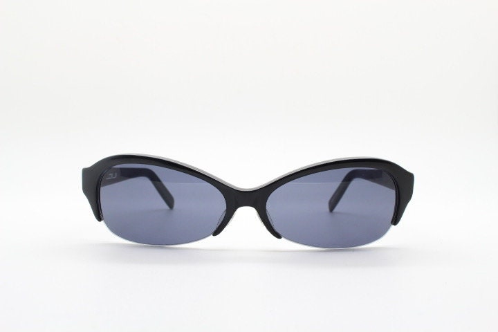 Stylised vintage oval praying mantis cateye sunglasses made in Japan. Superior Japanese black gloss acetate half frame bug eye