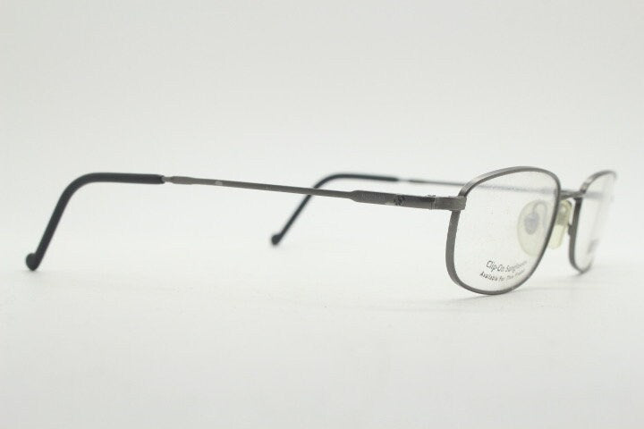 Moschino 90s vintage glasses model 3066 made in Italy. Small low profile rectangular optical frames. Prescription eyeglasses. RX. NOS
