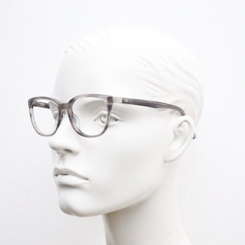 Calvin Klein rectangular eye glasses. Unisex transparent grey gloss acetate optical frames. Prescription eyeglasses. RX spectacles