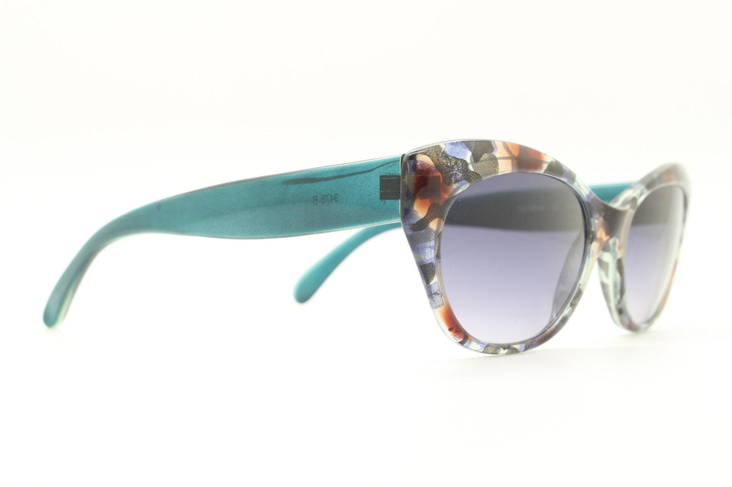 Piave 80s vintage colourful cat eye sunglasses made in Italy. Transparent cateye with abstract marbled patterns and gradient lenses. NOS