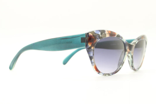 Piave 80s vintage colourful cat eye sunglasses made in Italy. Transparent cateye with abstract marbled patterns and gradient lenses. NOS