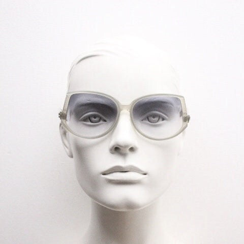 Silhouette 70s vintage abstract upside down sunglasses model 3018 made in Austria. Dynamic grey pearlised acetate frame with white stripes