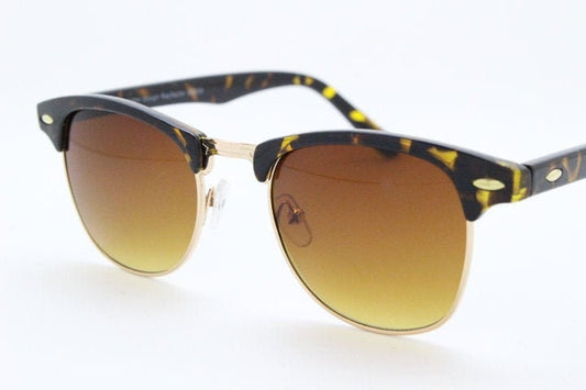 90s vintage browline sunglasses. All time classic design in tortoise gloss with gold half rim. 50s, 60s. Unused NOS