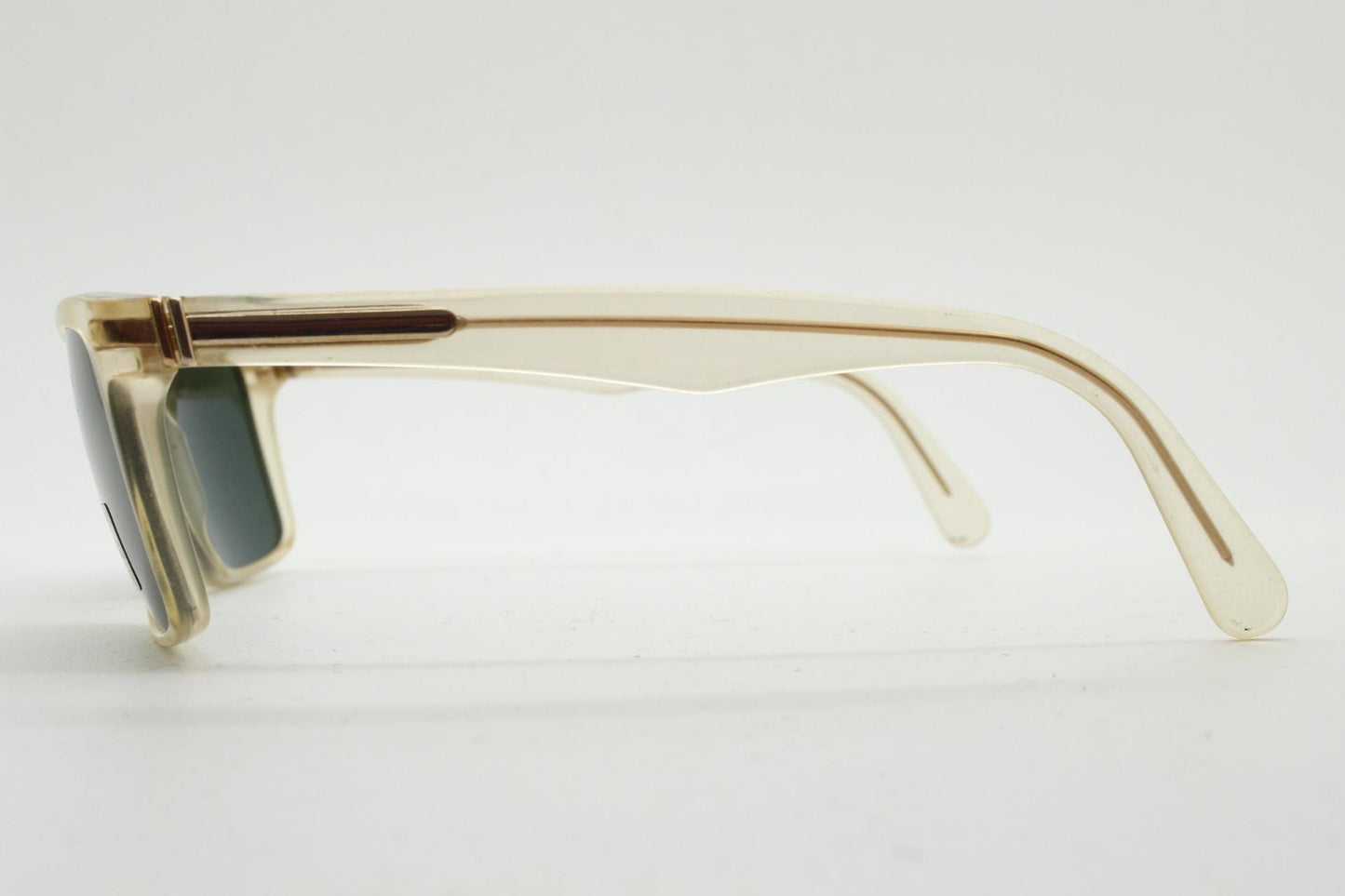 Luxottica 90s vintage rectangular sunglasses made in Italy. Transparent yellow acetate chunky frame with contrasting dark green lenses. BNWT