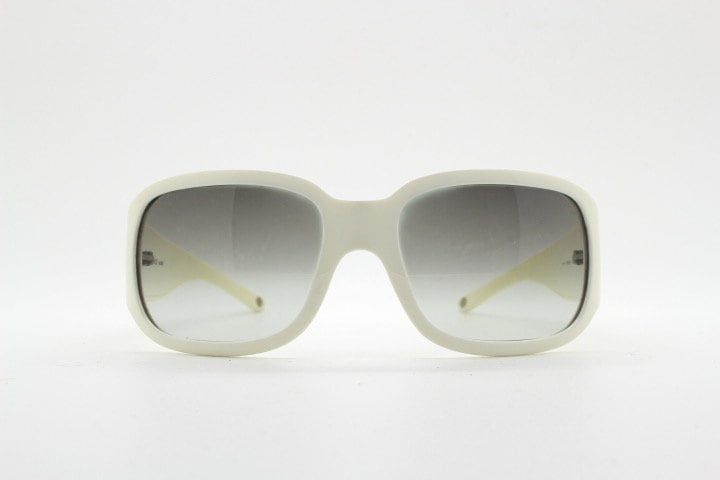 Versace Y2k vintage wrap around bug eye sunglasses. Curving white acetate shield frame with huge spell out diamante logo. 2000s. Rhinestone