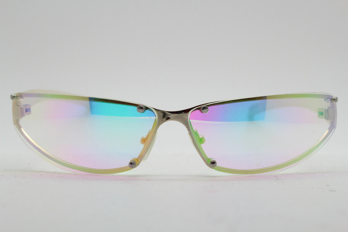 Y2K vintage wraparound sunglasses. Minimal chrome frame with light tone curved gold colour burst mirror lenses. 2000's. 90s. NOS
