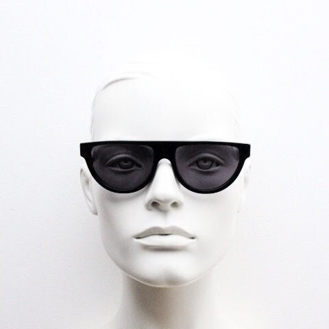 Retrosuperfuture thick flat top cat eye sunglasses hand made in Italy. All black gloss acetate frame. Vintage