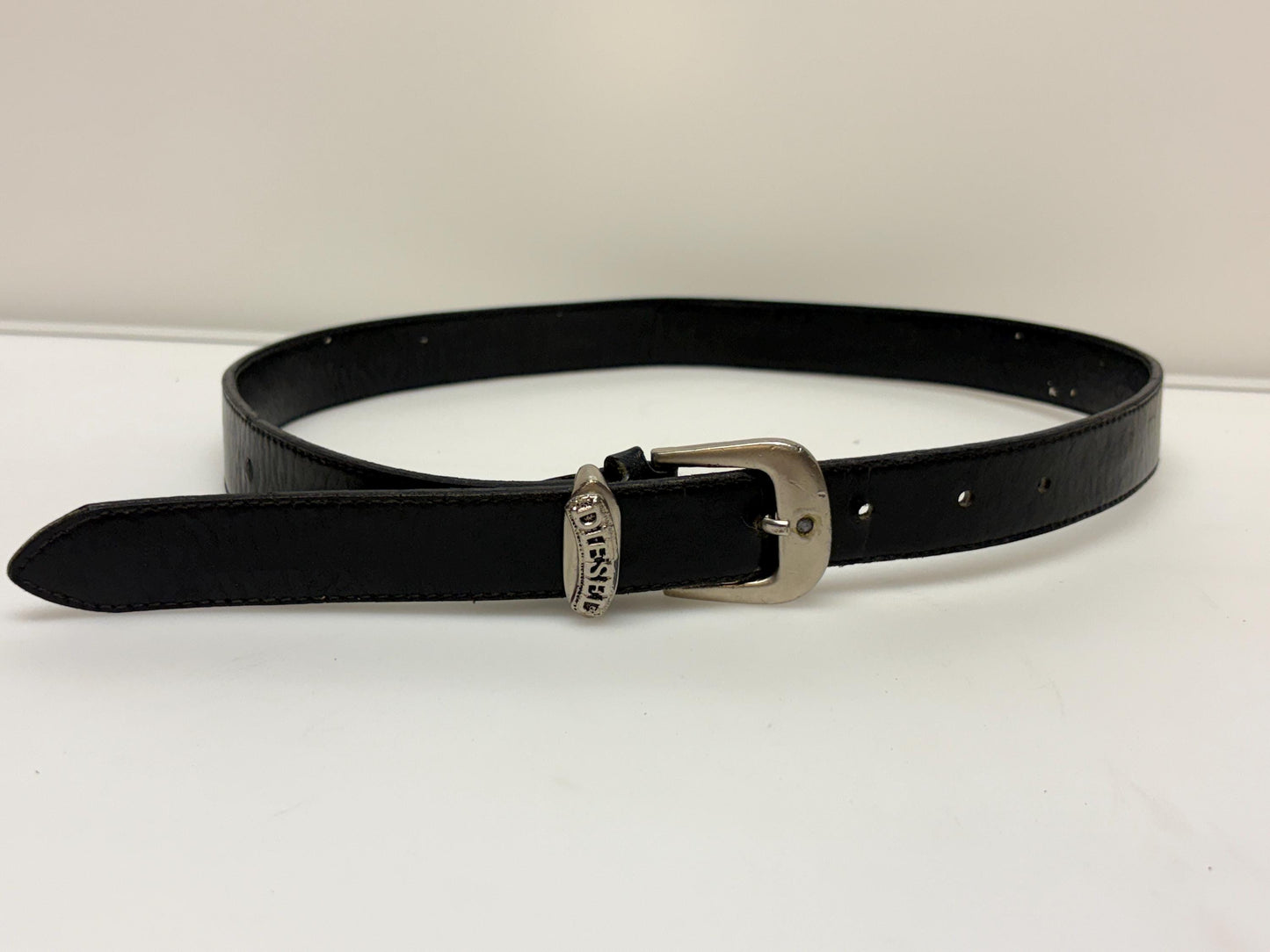 Diesel 90s vintage thick black genuine leather belt for jeans. Superior quality with silver buckle and simple script logo. Textured cowhide