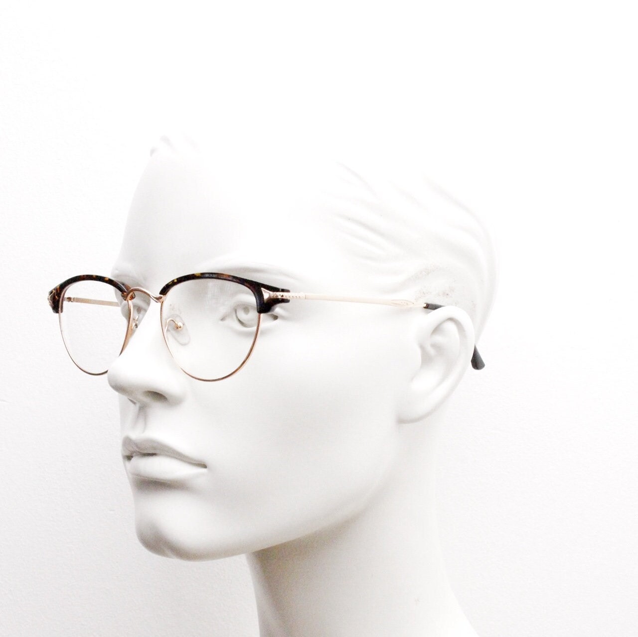 90s vintage browline cat eye glasses. Honey tortoise and gold half frame eyeglasses. 50s, 60s cateye design with clear lenses. NOS