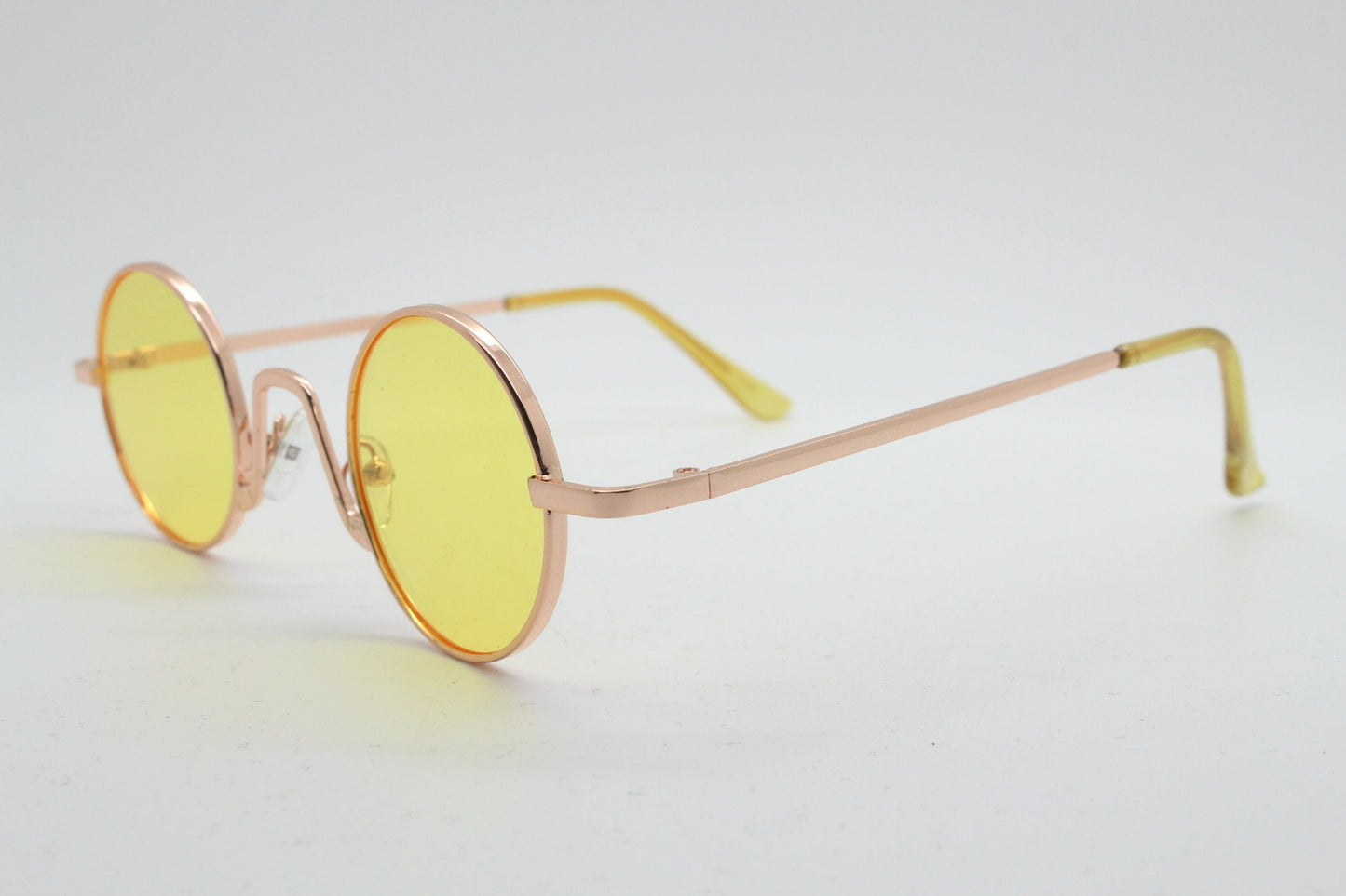 90s vintage small oval sunglasses. Imposing minimal gold victorian style frame with blazing canary yellow lenses. Steampunk. Unused BNWT