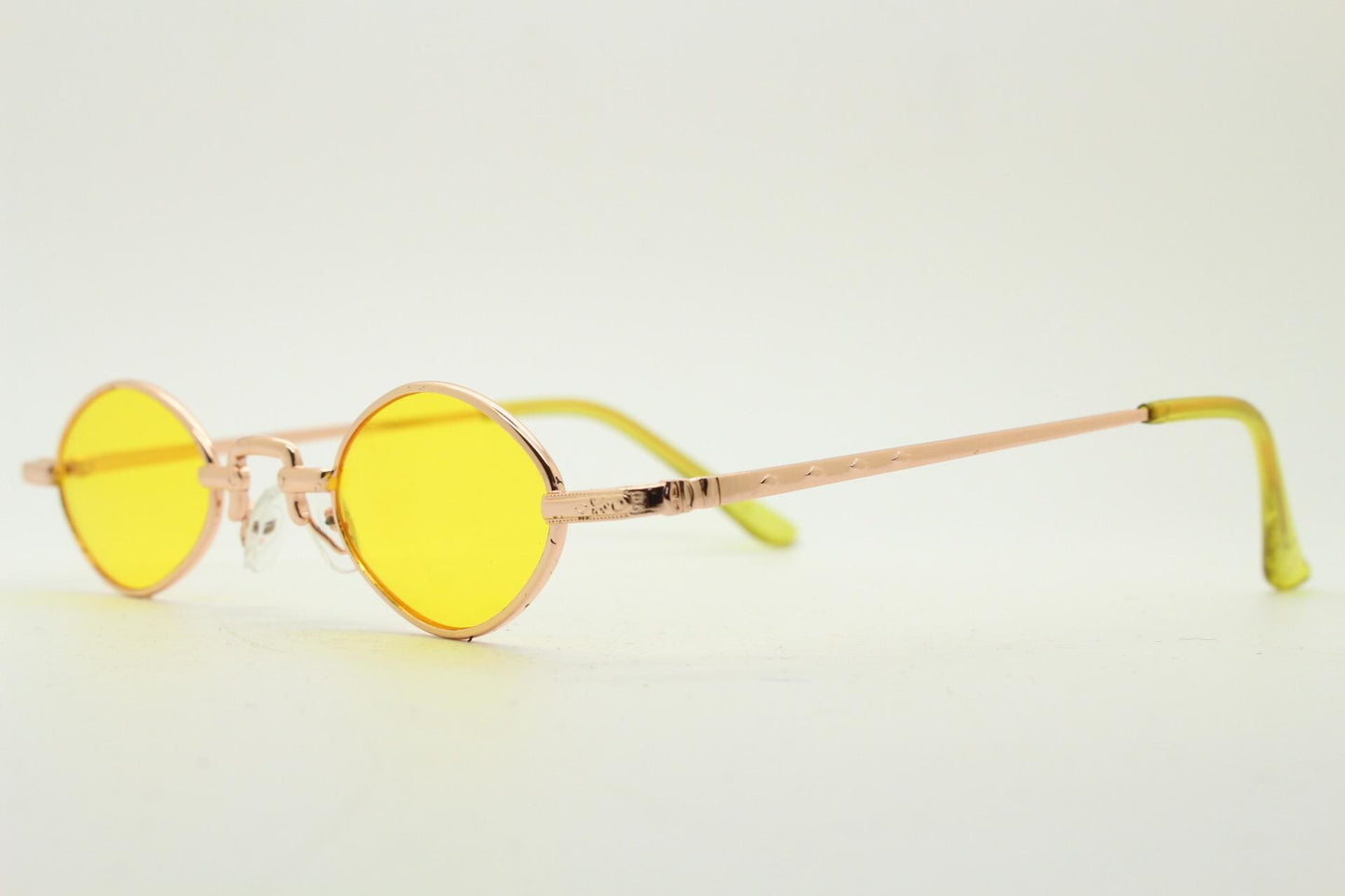 90s vintage small oval sunglasses. Imposing minimal rose gold metal victorian style frame with yellow lenses. Steampunk. BNWT