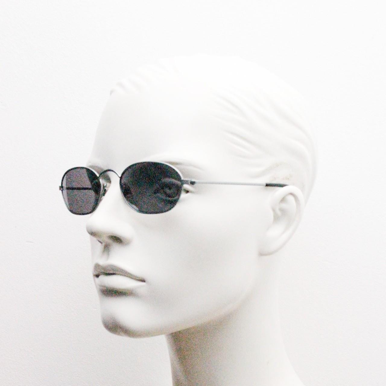 90s vintage small angular oval bug eye sunglasses. Minimal brushed satin finish frame with silver mirror lenses. Y2K. 2000s. Unworn NOS