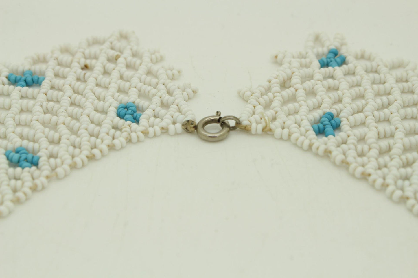 80s vintage beaded lattice collar necklace. Small white beads mixed with blue "x" patterns. Womens large versatile choker. Unused NOS