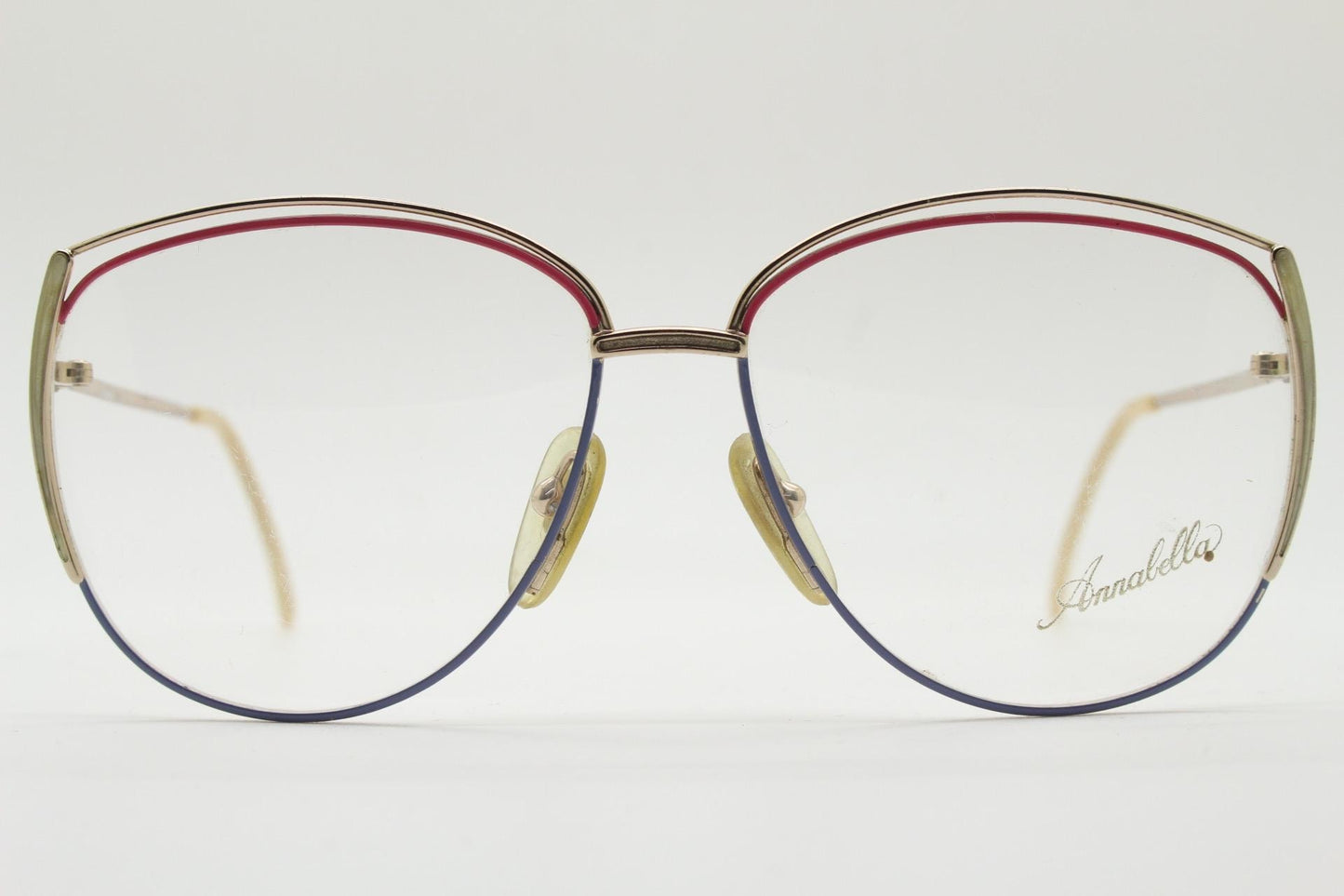 80s vintage gold metal eye glasses made in Italy by Annabella. Inventive double brow with pink highlights. Optical frame. Prescription NOS