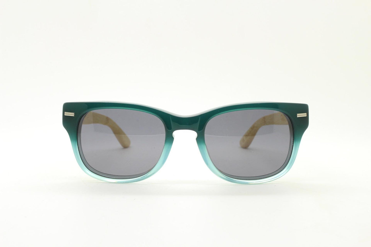 Calisons ryder modified wayfarer design sunglasses. Thickened blue acetate front with natural real wooden arms. Unused NOS