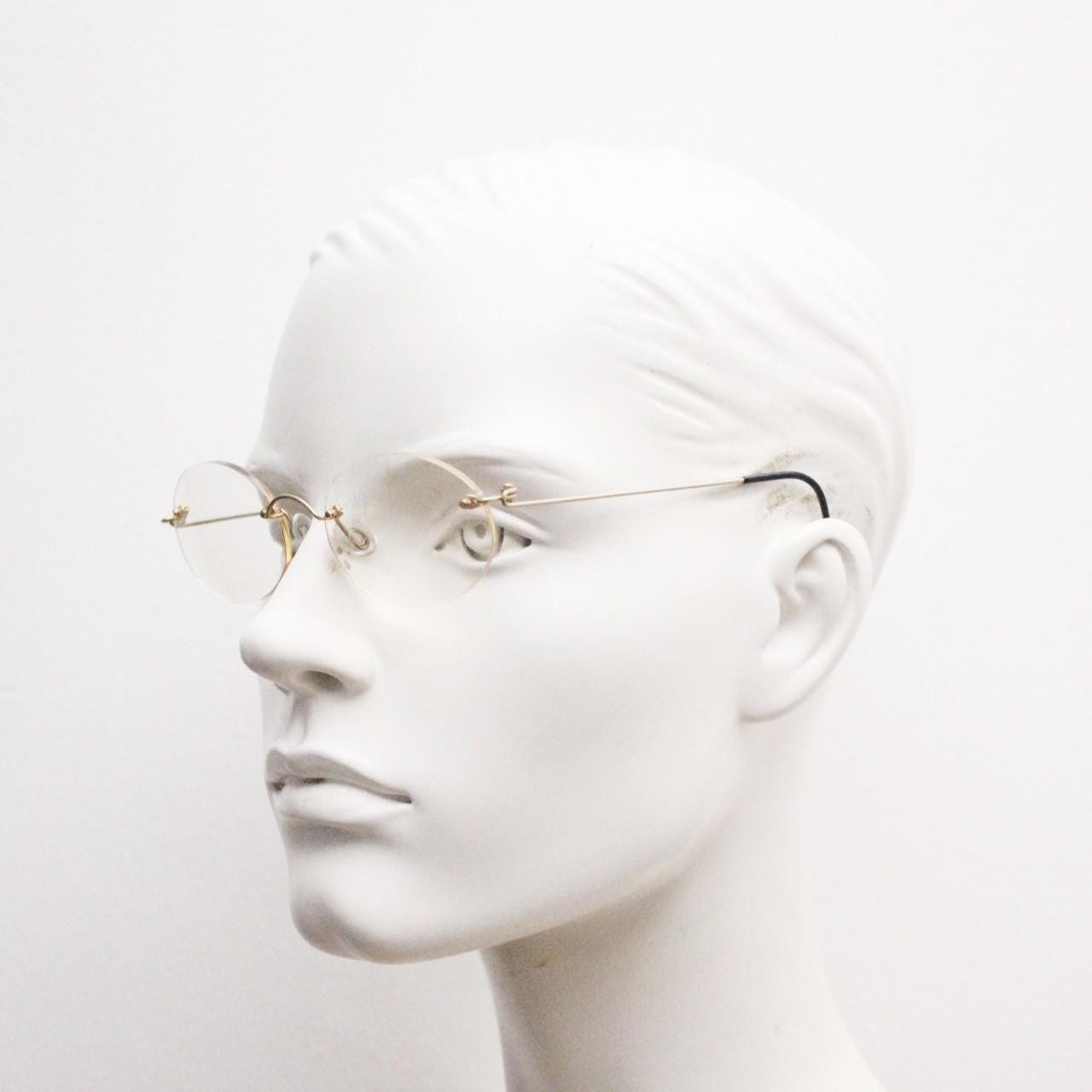 TRY vintage oval frameless eye glasses made in Italy. Futuristic minimal lightweight gold titanium optical frame. RX Spectacles