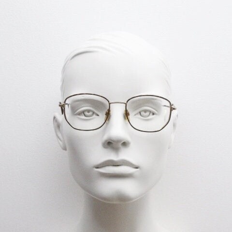 Giorgio Armani 90s vintage angular squared eye glasses made in Italy. Subtle metallic satin tiger print optical frames. Prescription RX