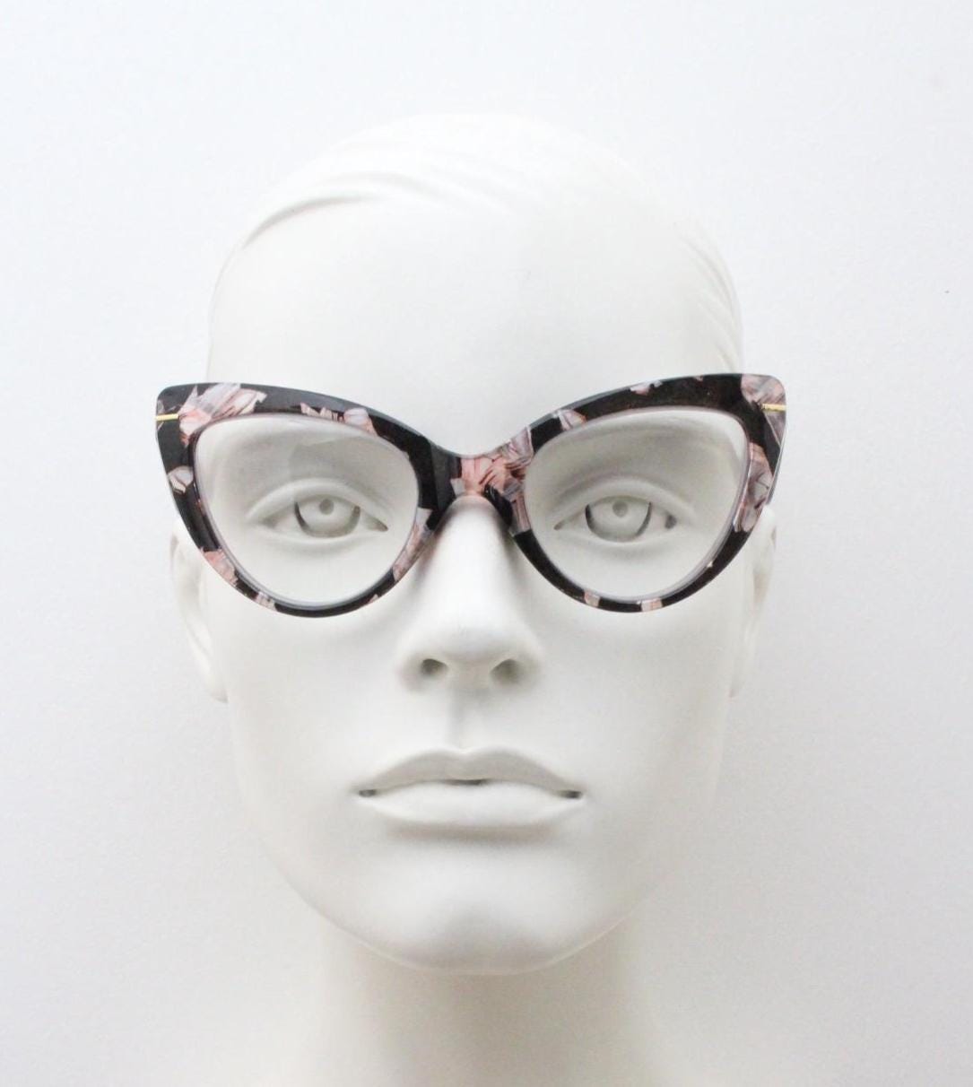 Dynamic pointed cat eye glasses. Transparent chunky cateye optical frame with pink and grey abstract pattern. Vintage Prescription RX