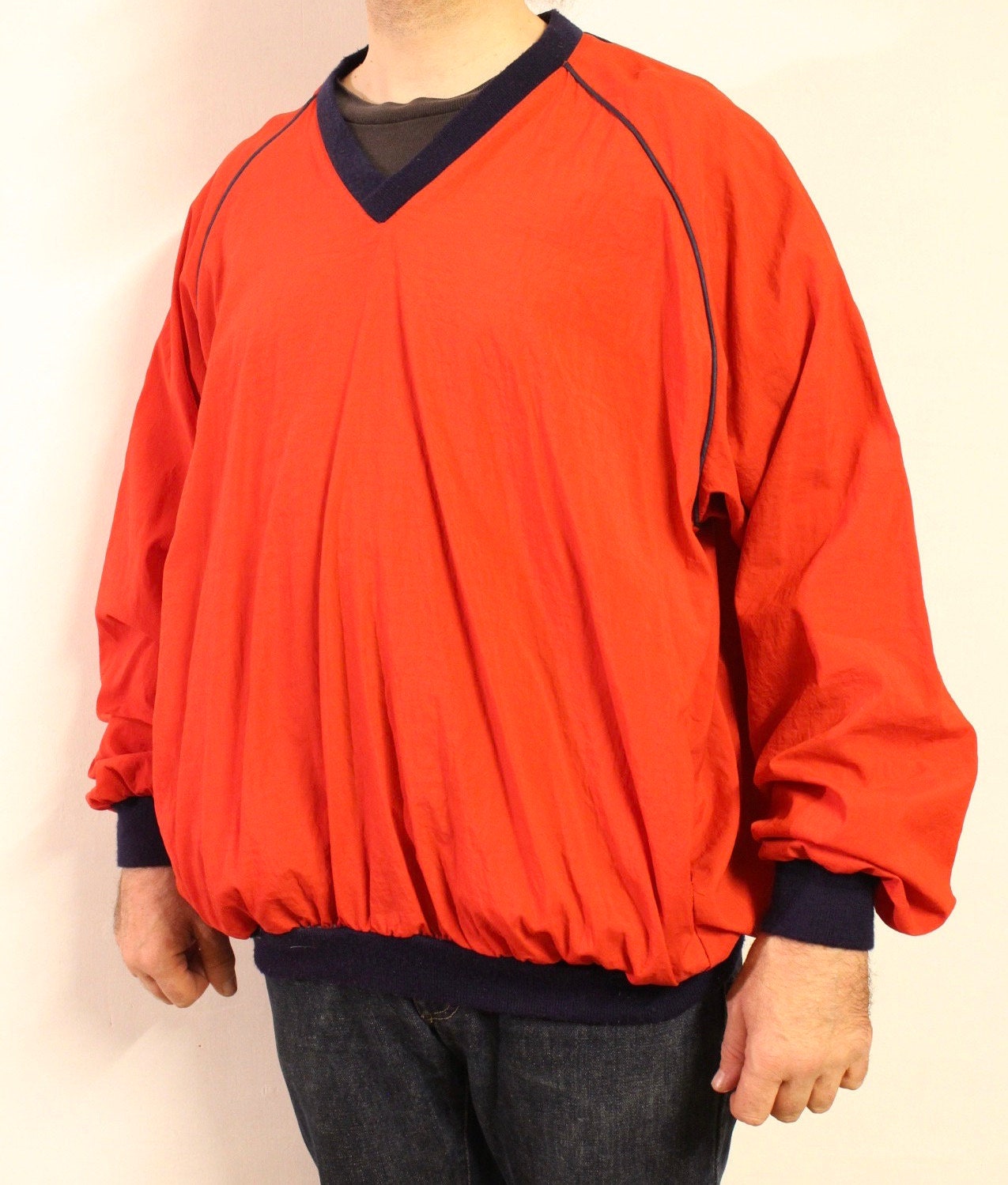 Vintage 80s oversized v neck pullover. Made in England. Bright red baggy football style unisex top. Club kids jumper. Rave