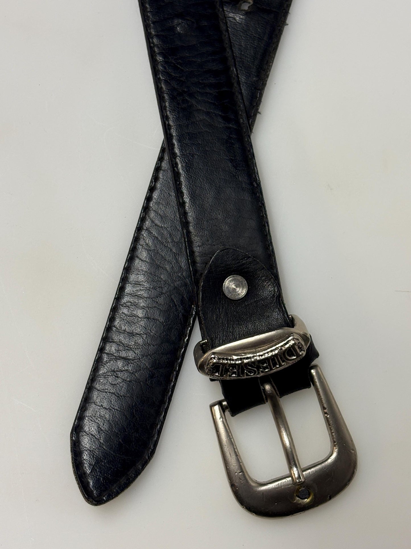 Diesel 90s vintage thick black genuine leather belt for jeans. Superior quality with silver buckle and simple script logo. Textured cowhide