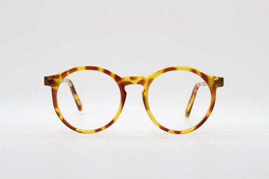 90s vintage round glasses. 30s, 40s design optical frames in a vibrant honey tortoise finish. Prescription eyeglasses. Spectacles.O Malley
