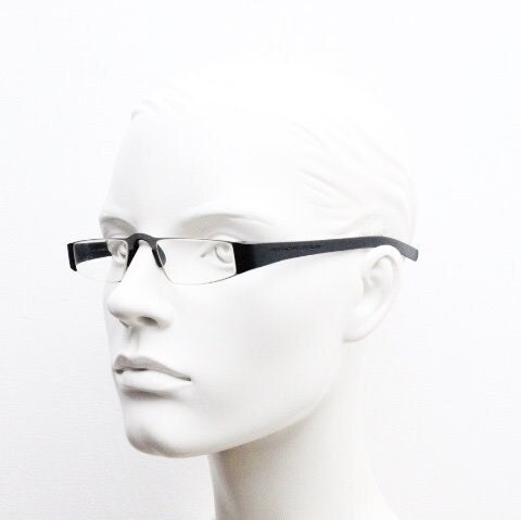 Porsche design rectangular eye glasses. Minimal grey metal optical frame in a matt finish with black arms. Vintage Prescription spectacles