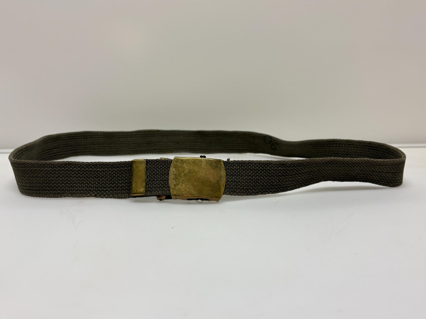 2 x bundle 80s vintage canvas army belts. One black plus one khaki green no holes format. Slide lock gold buckle. Webbing. Fully adjustable