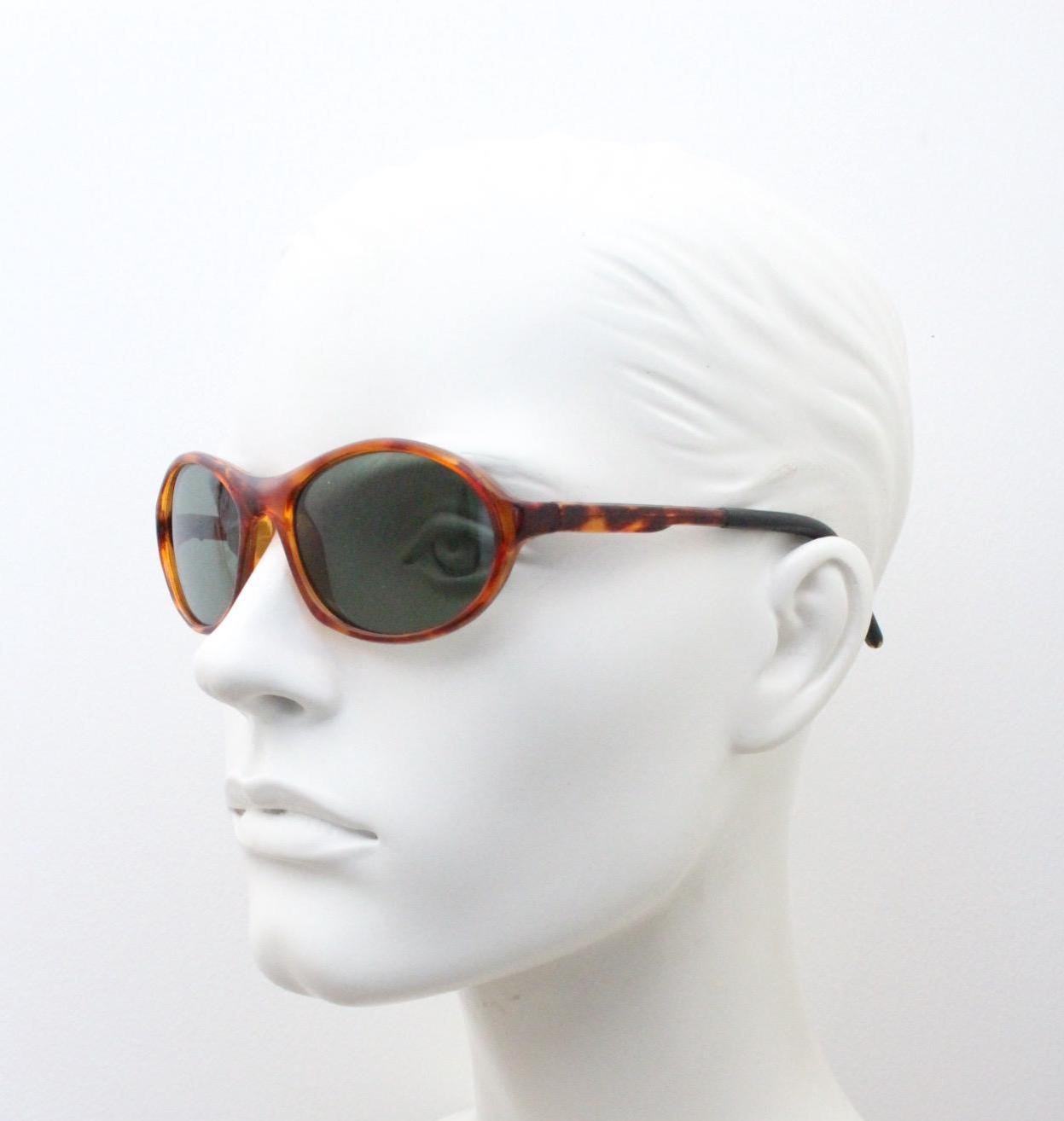 90s vintage oval small bug eye sunglasses. Tortoise gloss frame with quality real green glass lenses