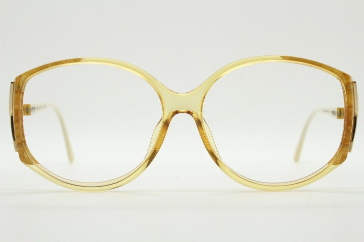 Christian Dior 70s vintage big round eye glasses made in Austria. Brown Optyl optical frames with distinctive logo. Prescription RX. NOS