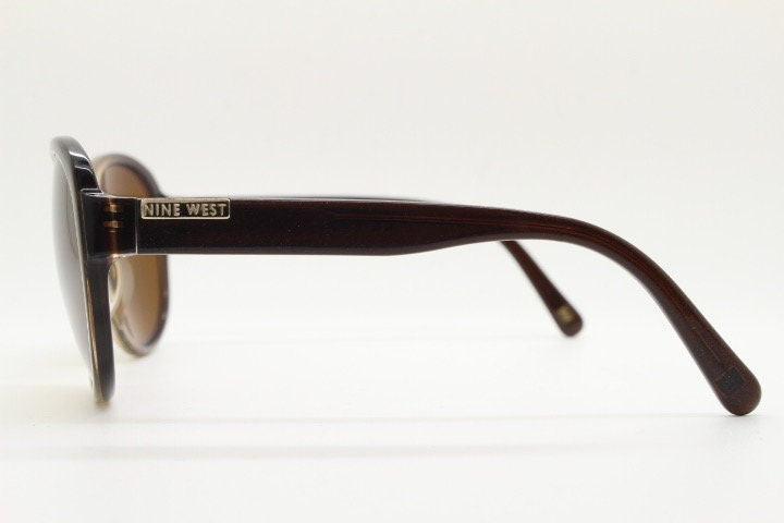 Nine West Y2K round vintage sunglasses. Brown to beige transparent ombre fade acetate frame. Womens 2000s bug eye