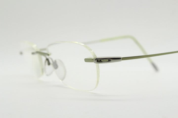 Silhouette rectangular frameless eye glasses made in Austria. Minimal lightweight optical frame with silver trim. Prescription RX