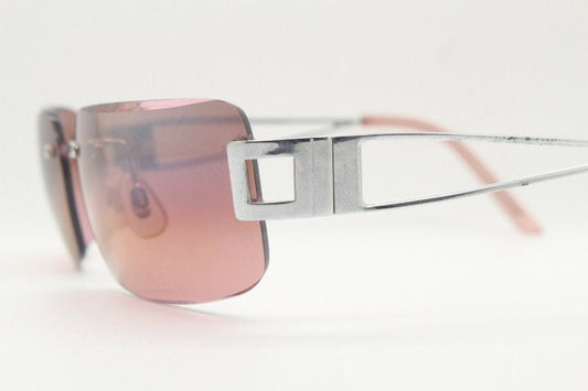 Y2K vintage rectangle frameless visor sunglasses. 2000's chrome trim wrap around with pink curved and bevelled lenses. 00's NOS