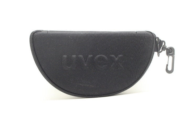 Uvex Y2k vintage wrap around bug eye sunglasses. Curving white sports shield frame with black lenses and tartan interior. Rave 2000s. NOS