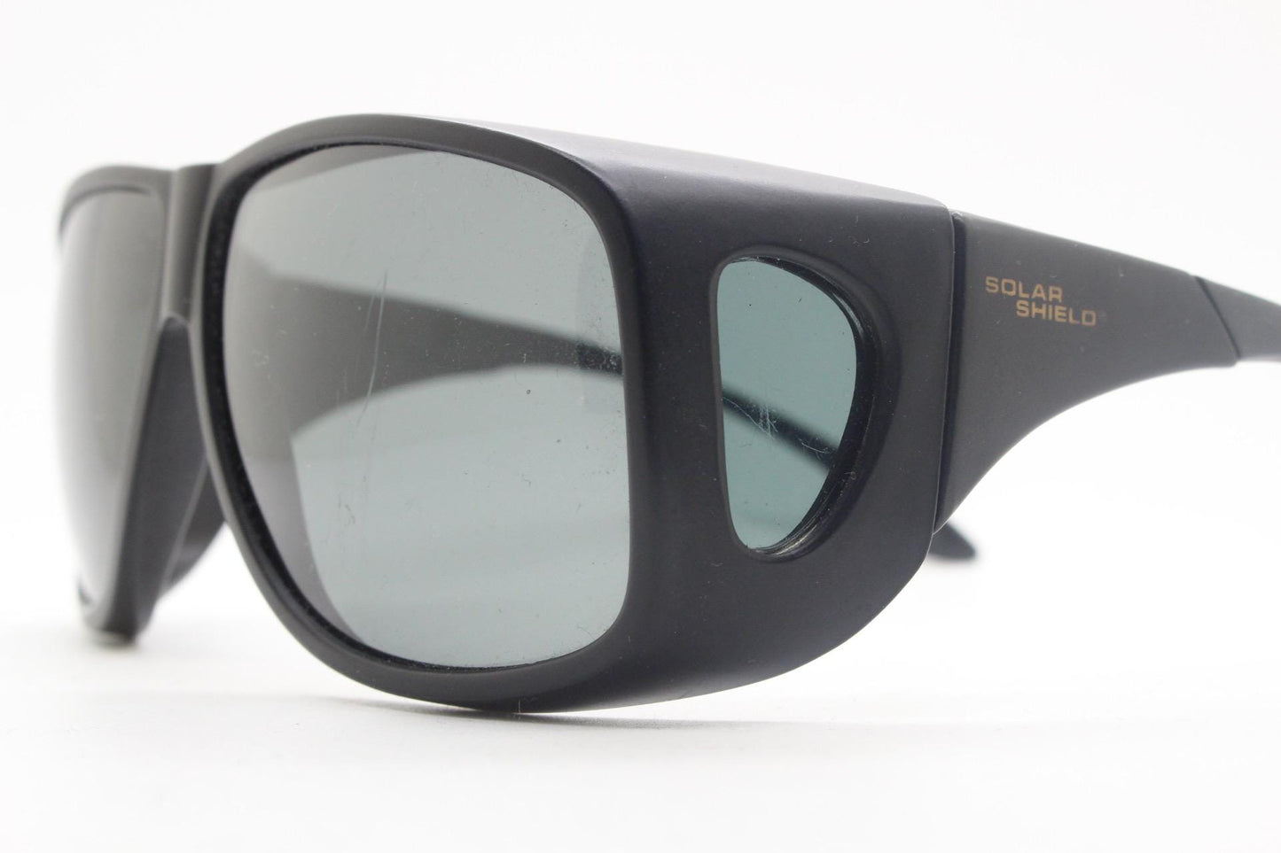 80s vintage massive oversized shield goggle sunglasses with side windows. Big black matt wrap around frame with grey lenses