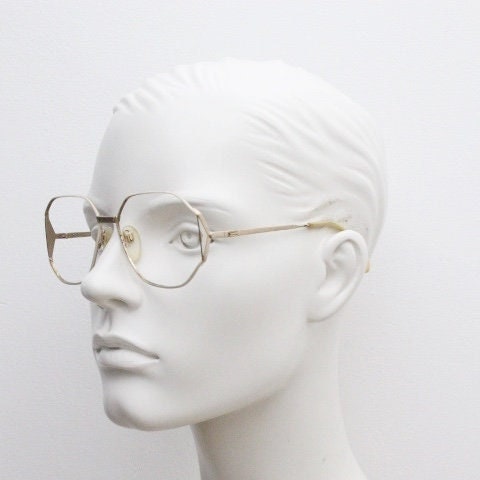 Silhouette 70s vintage octagon eye glasses. Womens sophisticated angular golden optical frame with white detail. Prescription eyeglasses. Rx