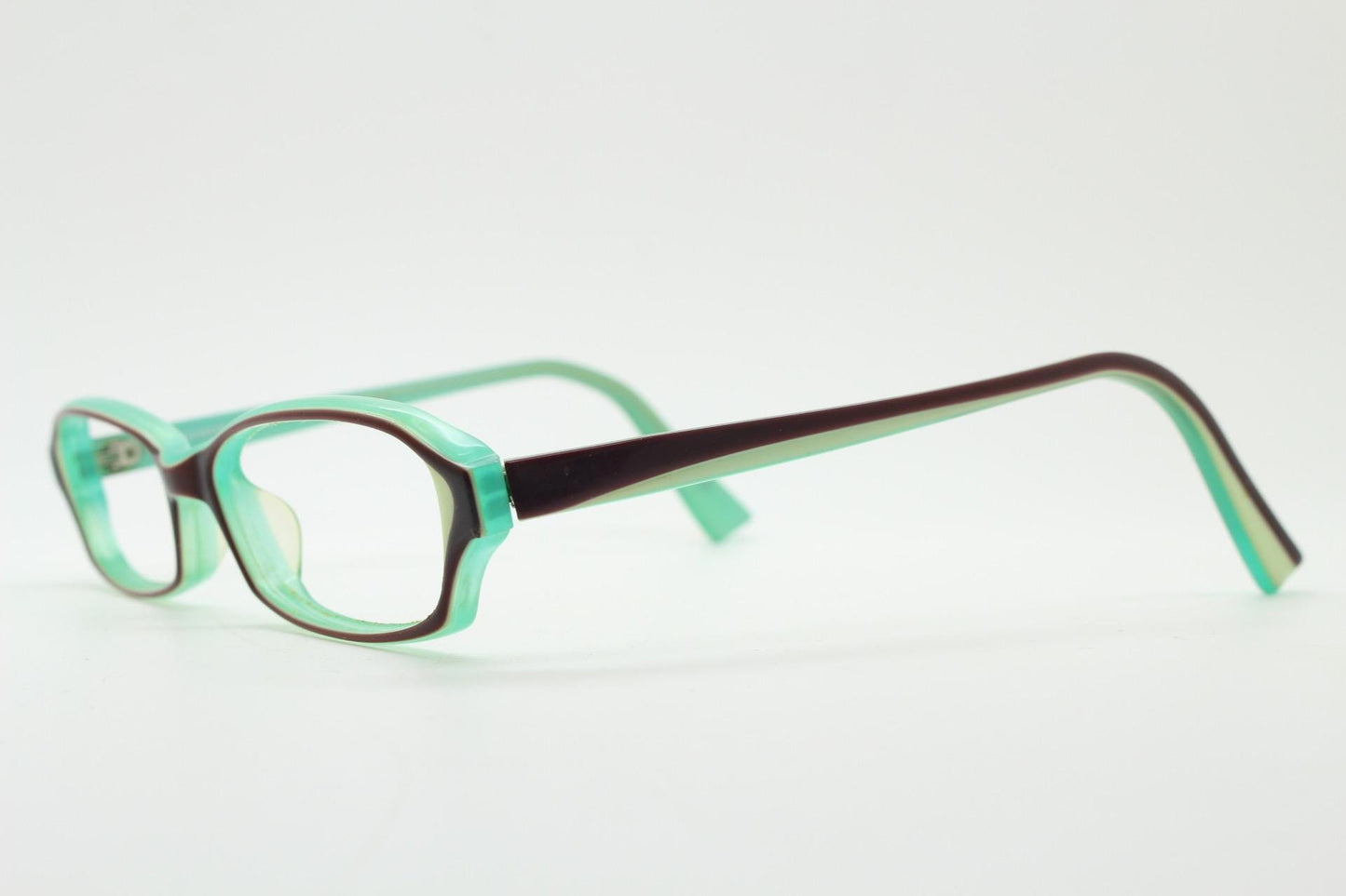 Francois Pinton Paris rectangular cat eye glasses made in Italy. Womens vibrant green acetate optical frames with brown front. Vintage