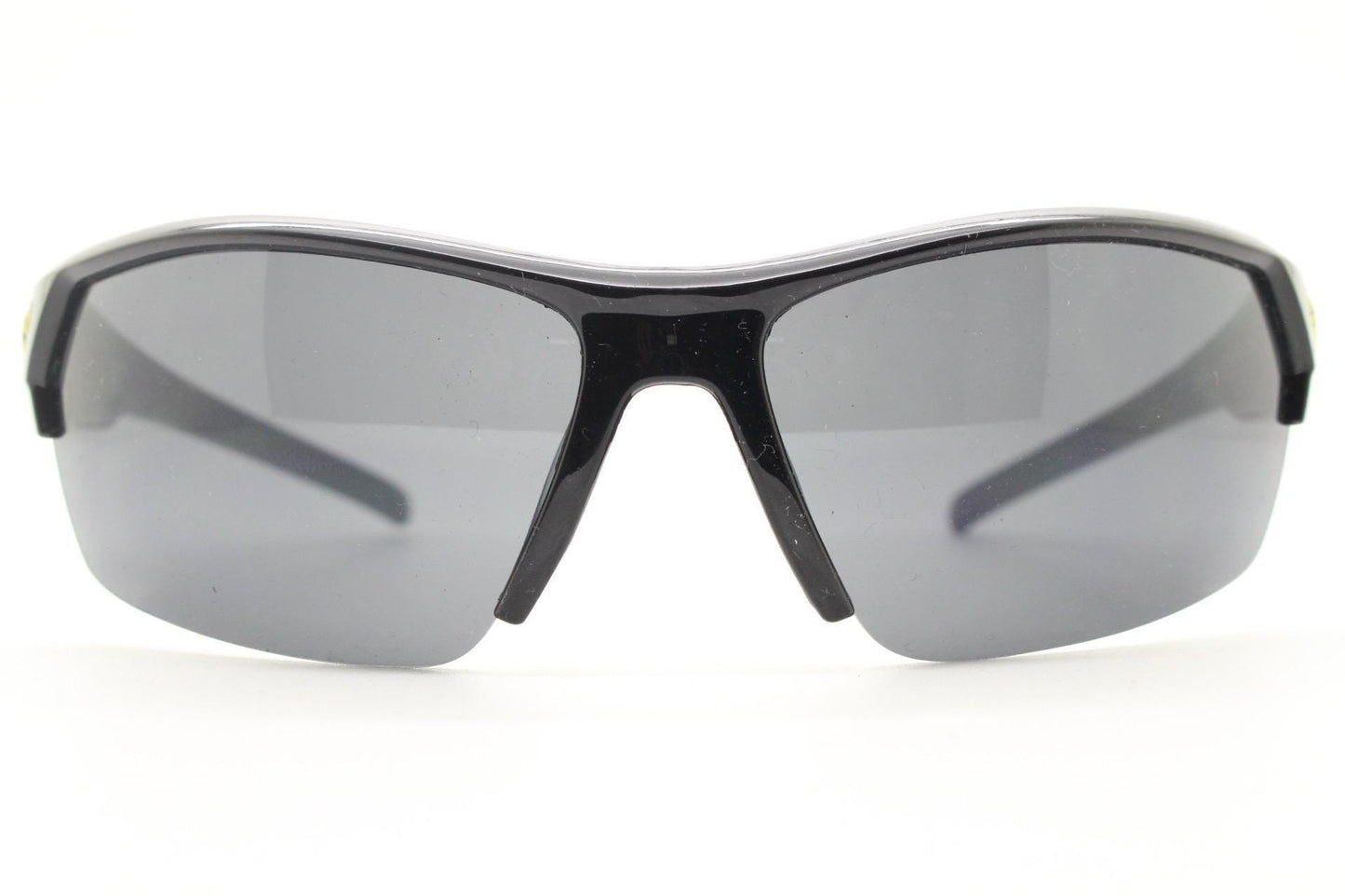Y2K vintage sport shield sunglasses. All black wraparound aerodynamic visor with blue arm detail. 2000's. 90s. Unused NOS