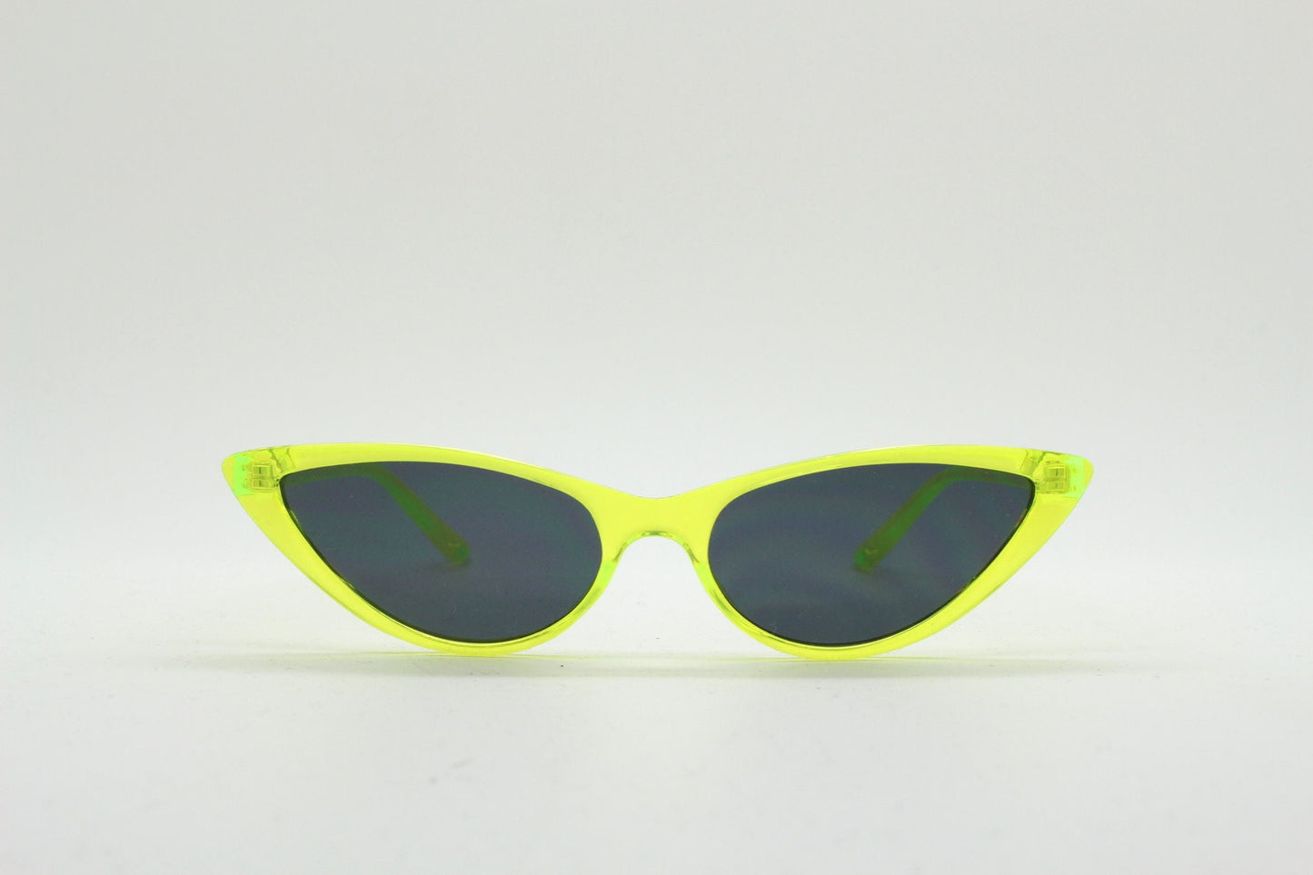 Y2K vintage extreme pointed cat eye sunglasses. Stylised yellow transparent frame with black lenses. Womens 50s style psychabilly. NOS