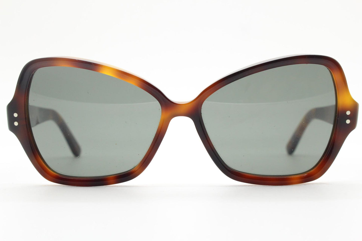 Celine Paris vintage angular cat eye sunglasses made in Italy. Tortoise butterfly frame in good proportions with green lenses. Womens Y2K