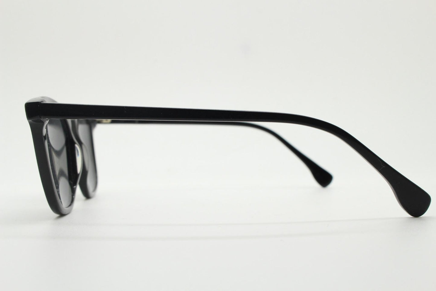 Vintage 90s slim frame black horn rim sunglasses. All time classic retro refined wayfarer design in gloss with black lenses