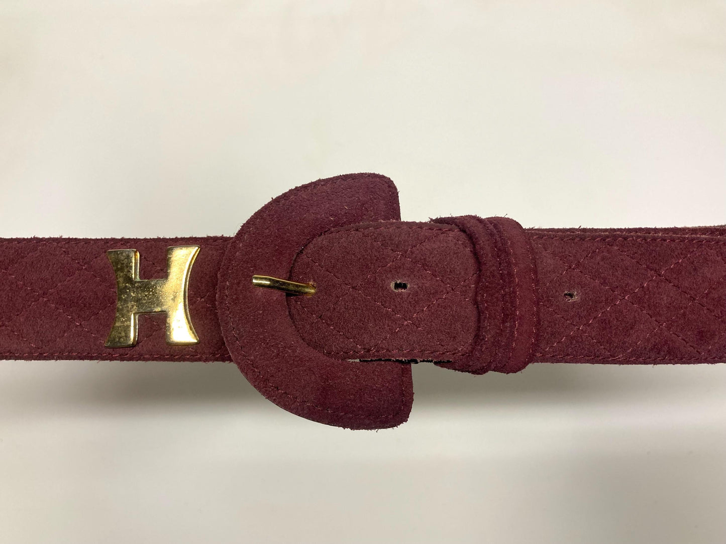 80s vintage womens dress belt in wine real suede with substantial covered buckle and gold domed hearts. Made in France by Chanon. NOS