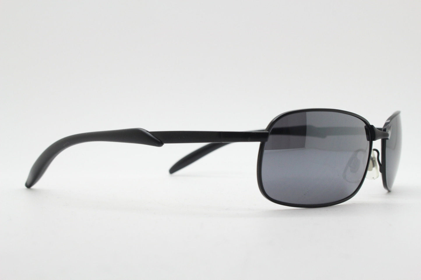 Y2K vintage wraparound sunglasses. Black satin matt finish on rectangular frame with slight mirror glaze lenses. 2000's. 90s. Unused NOS