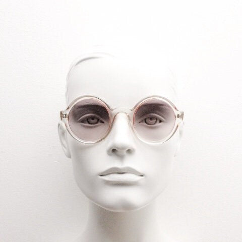 Mary Quant 60s vintage round sunglasses made in France. Yellow crystal transparent lucite frame in with contrasting dark graduating lenses