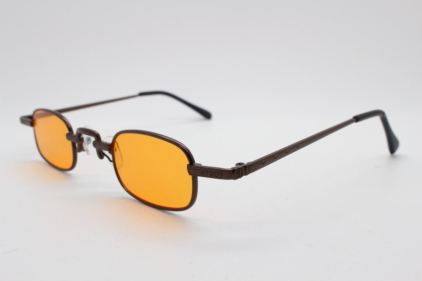 90s vintage small rectangular sunglasses. Imposing minimal bronze brown metal victorian style frame with orange lenses. Steampunk. BNWT