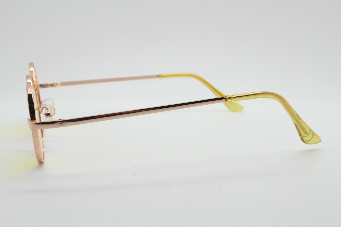 90s vintage small oval sunglasses. Imposing minimal gold victorian style frame with blazing canary yellow lenses. Steampunk. Unused BNWT