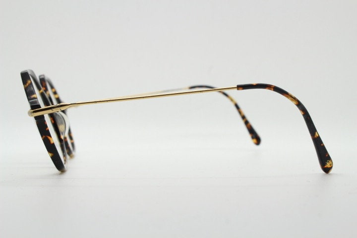 Kaleos hexagon eye glasses model Trevethyn made in Italy. Amber tortoise acetate optical frames with gold arms. Prescription eyeglasses. RX